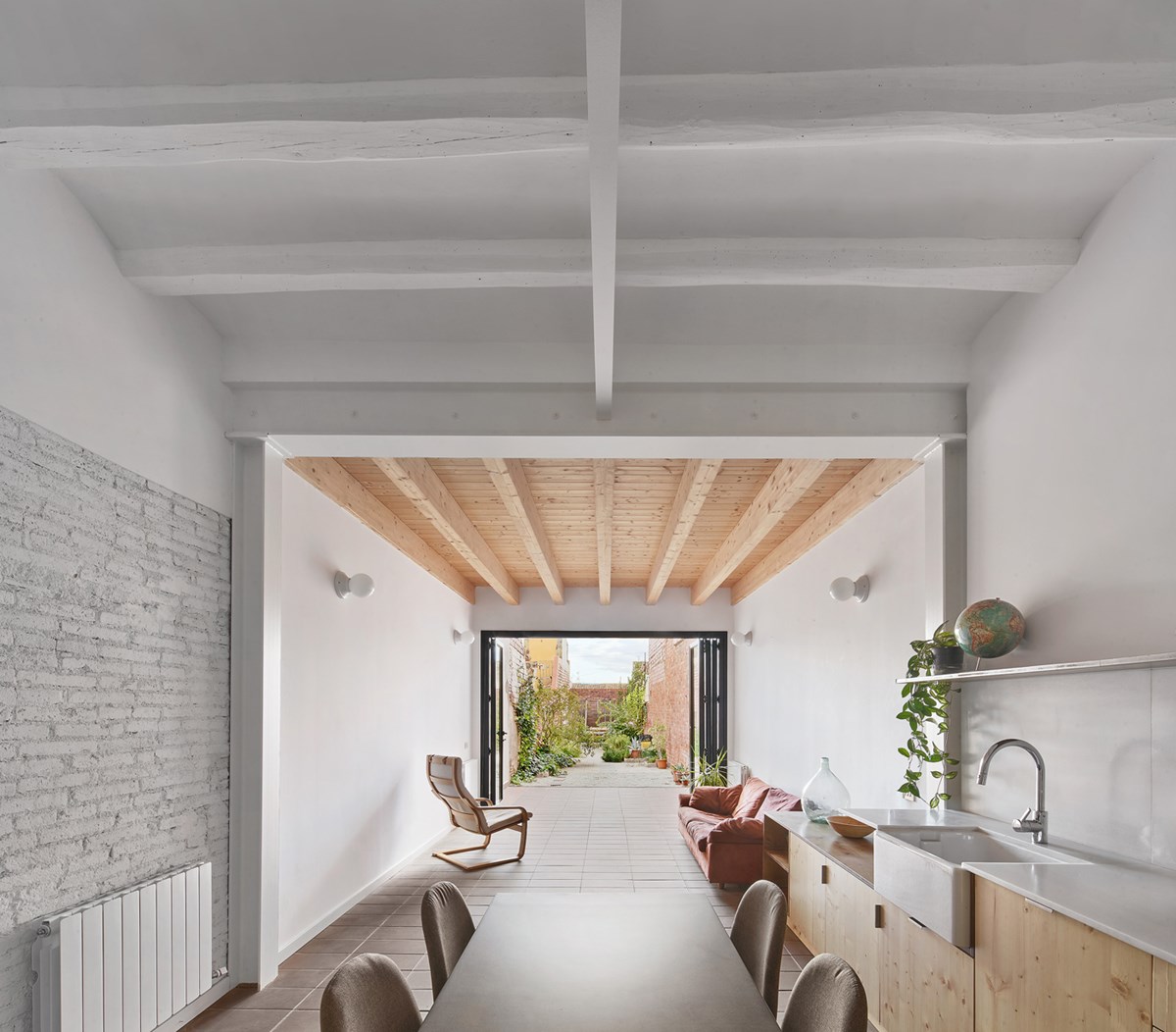 82SAN - Narrow Row House Transformed into Energy-Efficient Family Home