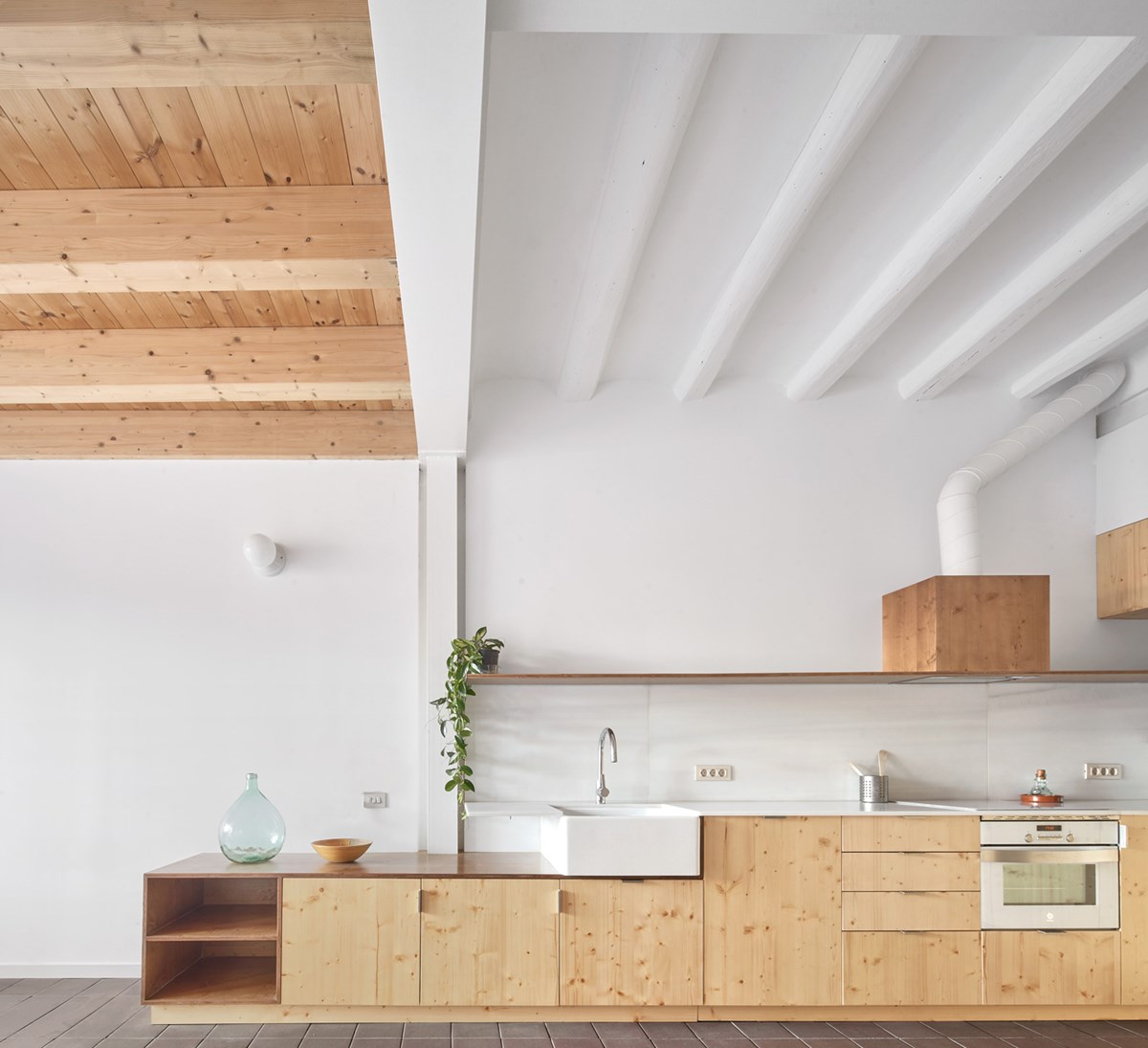 82SAN - Narrow Row House Transformed into Energy-Efficient Family Home